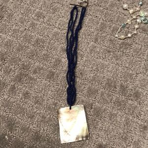 Blue lapis beads with abalone shell